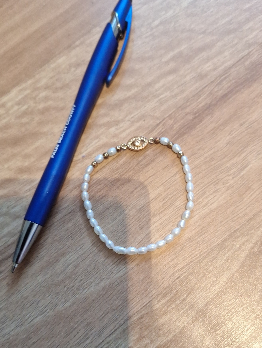 Delicate White Pearl Stretch Bracelet with Gold Accent Evil Eye Thin